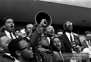 Rev. Abernathy speaking in front of Selma city hall protesting the denial of the right to vote to black citizens of Selma, Alabama. 1965