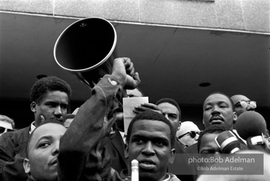 Rev. Abernathy speaking in front of Selma city hall protesting the denial of the right to vote to black citizens of Selma, Alabama. 1965