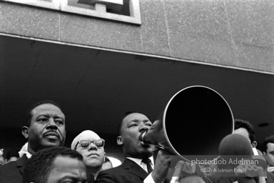 Martin Luther King speaking in front of Selma city hall protesting the denial of the right to vote to black citizens of Selma, Alabama. 1965