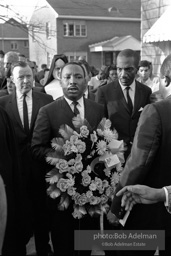 Dr. King carrying a wreath, leads a memorial march for civil-rights crusader, Rev. James Reeb.Selma, Alabama. 1965