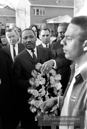 Dr. King carrying a wreath, leads a memorial march for civil-rights crusader, Rev. James Reeb.Selma, Alabama. 1965