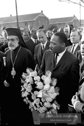 Dr. King carrying a wreath, leads a memorial march for civil-rights crusader, Rev. James Reeb.Selma, Alabama. 1965
