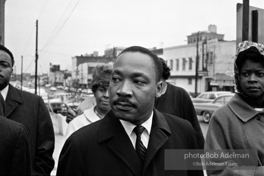 A triumphant King leaves the federal courthouse  after a federal judge, Frank Johnson, rules that the Selma-to-Montgomery march can proceed, Montgomery,  Alabama.  1965