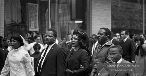 The King family leads the mourners march through the streets of Atlanta  to begin Martin Luther King's funeral