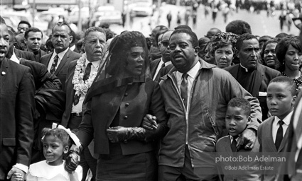 Mrs. King with Rev Abernathy leading the mourners at the funeral of Dr. King. Atlanta, GA, 1968