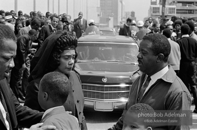 The King family leads the mourners march through the streets of Atlanta  to begin Martin Luther King's funeral