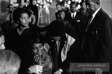 Mourners view Martin Luther King's open casket.Atlanta, GA, 1968