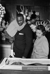 Mourners view Martin Luther King's open casket.Atlanta, GA, 1968