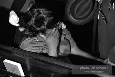 A woman grieves after viewing the open casket of Martin Luther King, Atlanta, GA. 1968.