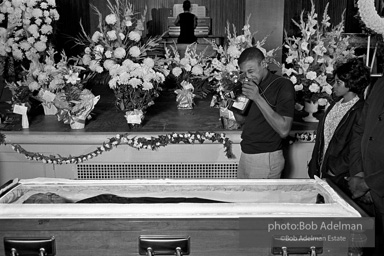 Mourners view Martin Luther King's open casket.Atlanta, GA, 1968