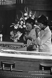 Mourners view Martin Luther King's open casket.Atlanta, GA, 1968