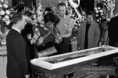 Mourners view Martin Luther King's open casket.Atlanta, GA, 1968