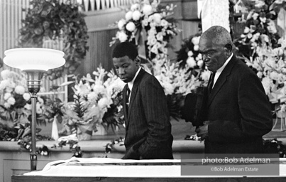 Mourners view Martin Luther King's open casket.Atlanta, GA, 1968