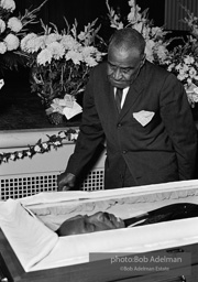 Mourners view Martin Luther King's open casket.Atlanta, GA, 1968