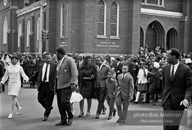 The King family leads the mourners march through the streets of Atlanta  to begin Martin Luther King's funeral