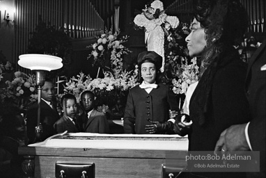 Members of King’s family, including his wife and children, view his body as it lies in state,  Atlanta, Georgia.  1968-