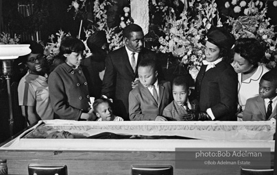 Members of KingÕs family, including his wife and children, view his body as it lies in state,  Atlanta, Georgia.  1968-