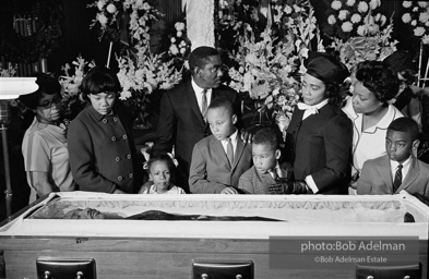 Members of King’s family, including his wife and children, view his body as it lies in state,  Atlanta, Georgia.  1968-