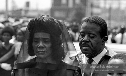 Mrs. King with Rev Abernathy leading the mourners at the funeral of Dr. Kinh. Atlanta, GA, 1968