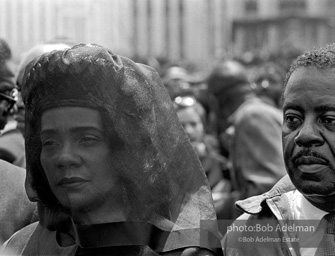 Mrs. King with Rev Abernathy leading the mourners at the funeral of Dr. Kinh. Atlanta, GA, 1968