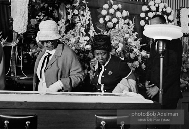 Mourners view Martin Luther King's open casket.Atlanta, GA, 1968