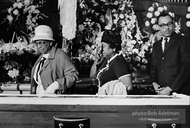 Mourners view Martin Luther King's open casket.Atlanta, GA, 1968