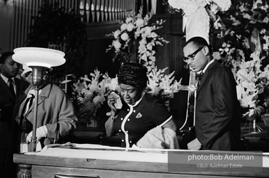 Mourners view Martin Luther King's open casket.Atlanta, GA, 1968