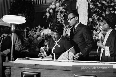 Mourners view Martin Luther King's open casket.Atlanta, GA, 1968