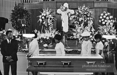 Mourners view Martin Luther King's open casket.Atlanta, GA, 1968