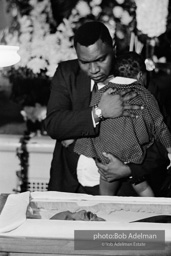 Mourners view Martin Luther King's open casket.Atlanta, GA, 1968