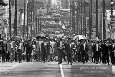 As many as 50,000 mourners follow the casket at King's funeral. Atlanta, GA. 1968