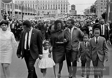 The King family leads the mourners march through the streets of Atlanta  to begin Martin Luther King's funeral