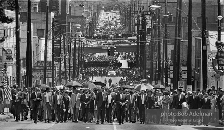 As many as 50,000 mourners follow the casket at King's funeral. Atlanta, GA. 1968
