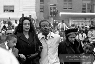 Reverand Abernathy escorts Mrs. King and Rosa Parks at memorial procession for slain Martin Luther King Jr. In front of Mrs. King are two of her sons. Memphis, TN. 1968