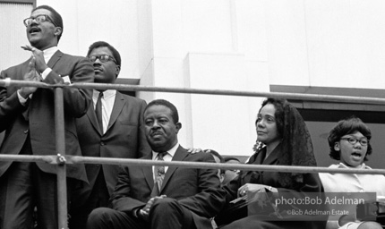 Reverand Abernathy seated beside Mrs. King at memorial service for her slain husband. Memphis, TN. 1968.