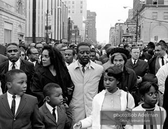 Reverand Abernathy escorts Mrs. King and Rosa Parks at memorial procession for slain Martin Luther King Jr. In front of Mrs. King are two of her sons. Memphis, TN. 1968