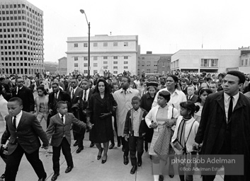 Reverand Abernathy escorts Mrs. King and Rosa Parks at memorial procession for slain Martin Luther King Jr. In front of Mrs. King are two of her sons. Memphis, TN. 1968