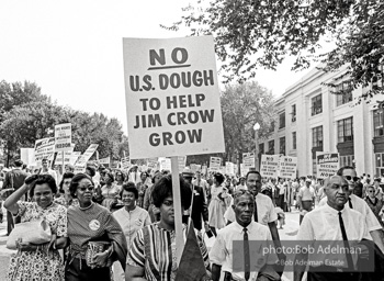 Marchers walking along the mall passing federal buildings almost meet the Lincoln Memorial,  Washington, D.C. August 28, 1963.