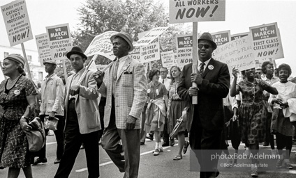 Proud Marchers advance along The Mall to the Lincoln Memorial. Washington, D.C. August 28, 1963.