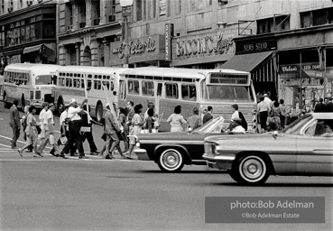 Demonstrators maily carried by busses arrive in downtown Washington to assemble for the historic march. August, 28, 1963.