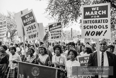 Proud Marchers advance along The Mall to the Lincoln Memorial. Washington, D.C. August 28, 1963.