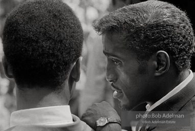 Sammy Davis talks with Harry Belafonte, both are on the steps of the Lincoln Memorial at the culmination of the March on Washington. 1963.