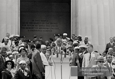 A. Phillip Randolph, director of the March on Washington. Randolph gives the opening remarks. Since the begining of WWII it was Randolph's idea that a massive march to protest the unfair treatment of African Americans come to Washington. 