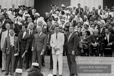 Members of the Congressional Delegation greet the assembled crowd. Standing in the front row are Jackob Javitz and next to him in a white suit Congressman Adam Clayton Powell. The purpose of the demonstration is to demand that  congress pass pending legislation outlawing state supported segrigation in public places throughout the land.  Washington D.C. Augist 28, 1963