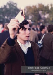 Pentagon Protests. Protestor burns draft card.Protest against the war in vietnam. Washington DC, 1968
