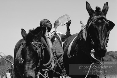 Jug blower Will Henley, Tishabee, Alabama 1983 - From the LIFE magazine story Artists of the Black Belt, 1983.