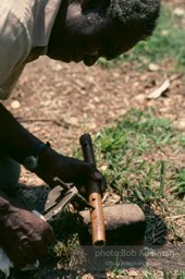 Ernest Mason making his four-hole fife,- From the LIFE magazine story Artists of the Black Belt, 1983.