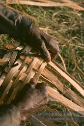 Preston Brown at work building one of his fish baskets - From the LIFE magazine story Artists of the Black Belt, 1983.