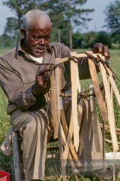 Preston Brown at work building one of his fish baskets - From the LIFE magazine story Artists of the Black Belt, 1983.