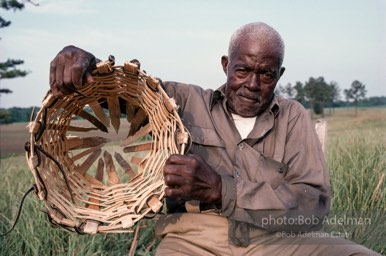 Preston Brown at work building one of his fish baskets - From the LIFE magazine story Artists of the Black Belt, 1983.